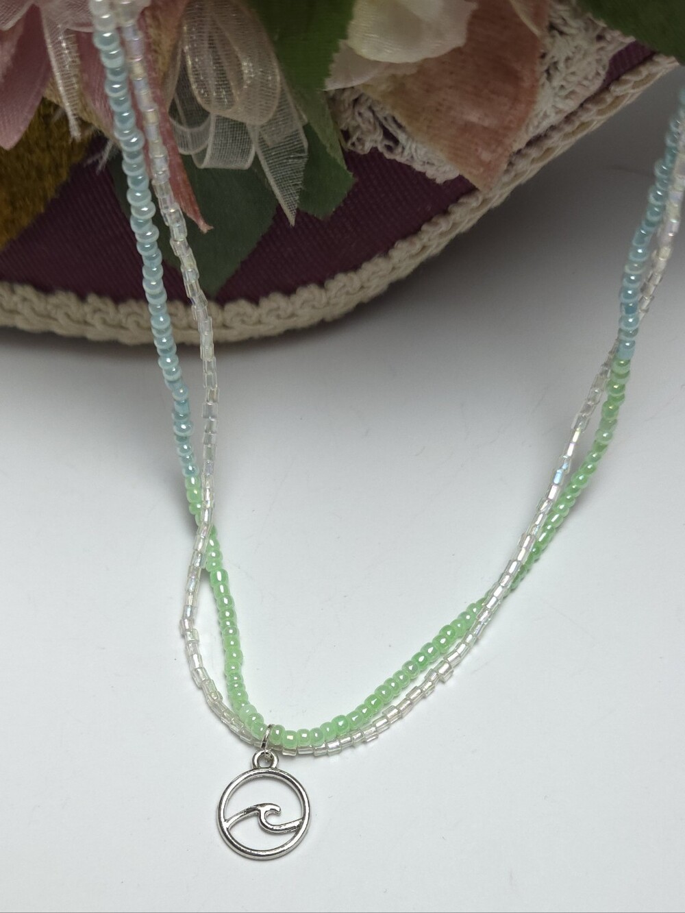 Silver Open Wave Pendant & Multi Strand Blue Iridecent Seed Beaded Necklace 17"